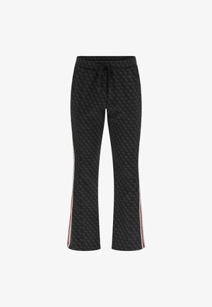 Black patterned joggers with flared legs, featuring a drawstring waist and contrasting red side stripes. Soft fabric with a textured finish.