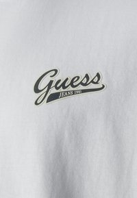 Guess Jeans SCRIPT - T-shirts basic - pure white