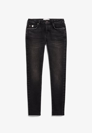 Schwarze Denim Skinny Jeans mit klassischem Fünf-Taschen-Design, das subtile Used-Effekte und kontrastierende Nähte aufweist. Strapazierfähiger, dehnbarer Stoff.