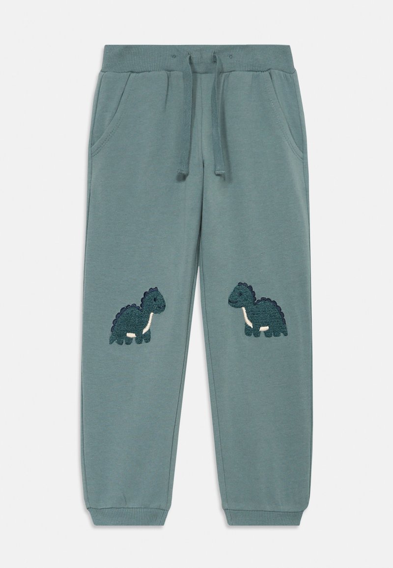 Pantaloni jogger verdi con vita a costine, coulisse e due tasche laterali. Presentano ricami di design di dinosauri su ciascuna gamba.