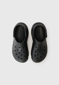 Black Crocs featuring a perforated design, textured upper, and adjustable heel strap. Made of lightweight, flexible material.