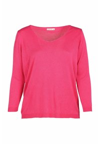 Vaaleanpunainen neulepaita, joka on valmistettu pehmeästä neuloksesta, sisältää V-pääntien, kolmannes-hihat ja rento leikkaus. Yksinkertainen, koristamaton muotoilu.