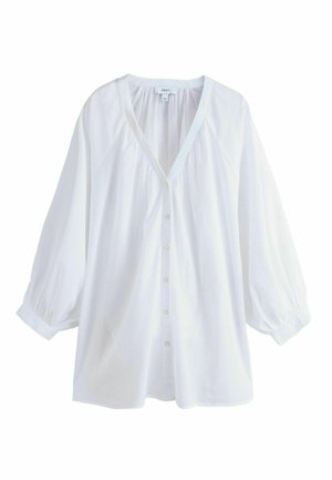 Weiße, locker sitzende Bluse mit langen Puffärmeln, V-Ausschnitt und Knopfleiste vorne.