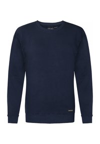 Mornarska dukserica s okruglim izrezom, izrađena od mekanog materijala, s dugim rukavima, rebrastim manžetama i donjim rubom, te oznakom logotipa na donjoj lijevoj strani.