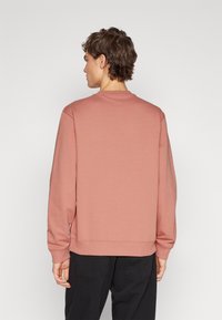 HUGO DIRAGOL - Bluză de molton - light/pastel red