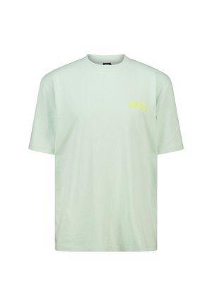 Light green cotton t-shirt with short sleeves and crew neck. Features a yellow "NYC" logo in a casual handwritten font.