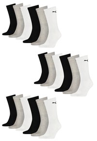 Schwarze, weiße und graue Crew-Socken mit Rippstruktur. Jede Socke hat ein kleines Logo am Knöchel. Zwei Sets mit je sechs Paaren.