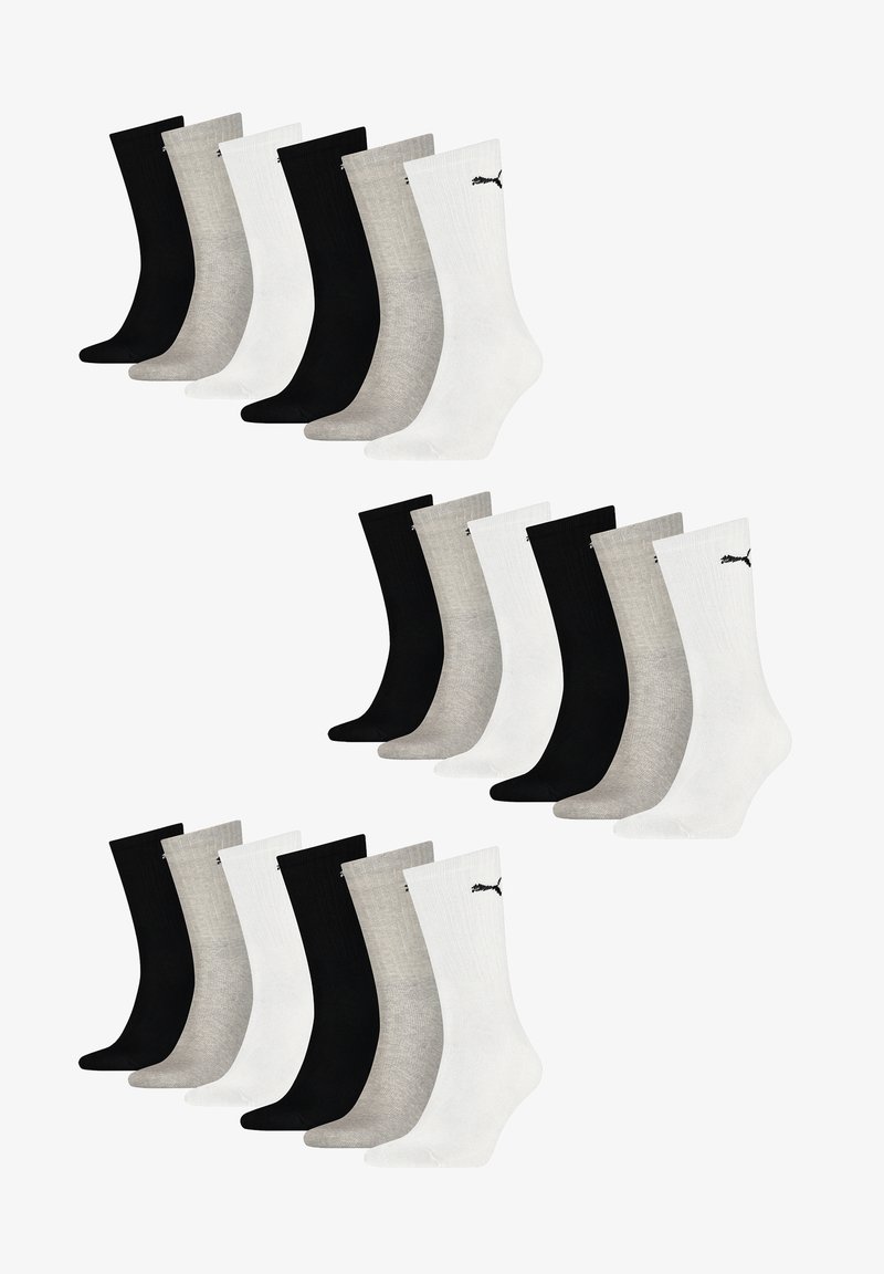 Schwarze, weiße und graue Crew-Socken mit Rippstruktur. Jede Socke hat ein kleines Logo am Knöchel. Zwei Sets mit je sechs Paaren.