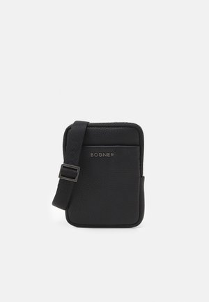 Black leather crossbody bag with a textured finish, featuring a zipper closure and adjustable strap. "BOGNER" logo displayed on the front.