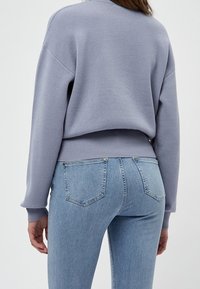 Minus Stickad tröja - blue