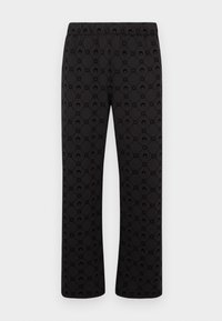 MOONOGRAM FLOCKED UNISEX - Pantalon de survêtement - black