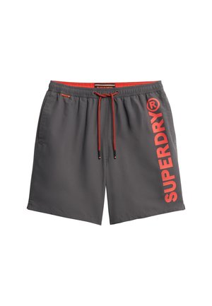 Gray swim shorts with red drawstring and logo. Made of smooth material, featuring side pockets and a relaxed fit.