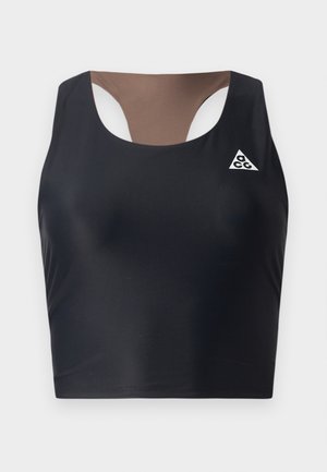 Top sportivo nero a fascia con un pannello marrone accentato, caratterizzato da un design con ritaglio e un piccolo logo bianco nell'angolo superiore. Materiale liscio.