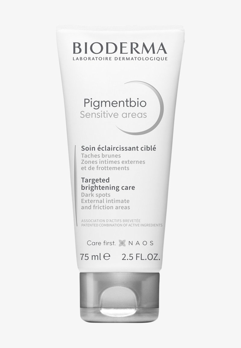 Tubo bianco con finitura lucida, etichettato "Pigmentbio Sensitive areas", 75 ml. Presenta testo grigio e tappo argentato. Prodotto dermatologico.
