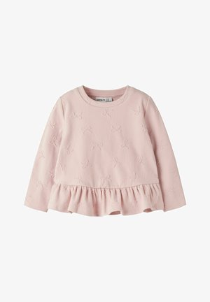 Camiseta de bebé de manga larga en rosa claro con pequeños lazos bordados y un bajo con volante.