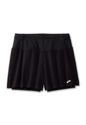 Shorts deportivos negros con un diseño de doble capa, que cuentan con una capa exterior sólida y una cinturilla texturizada. Incluyen un detalle de logo en la parte frontal.
