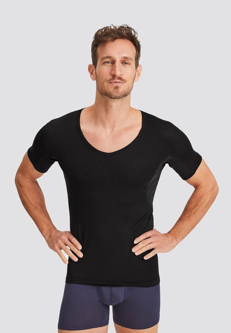 Black short-sleeve V-neck shirt made from a smooth fabric, fitted design with side panels, worn with navy blue boxer briefs.