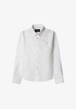 Chemise blanche à manches longues boutonnée avec col boutonné et petit logo brodé de rames croisées sur la poitrine gauche.