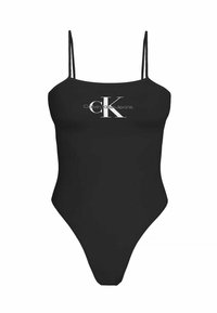 Traje de baño negro de una sola pieza con tirantes finos, que presenta un destacado logo blanco "CK" en el pecho y un diseño de pierna alta.