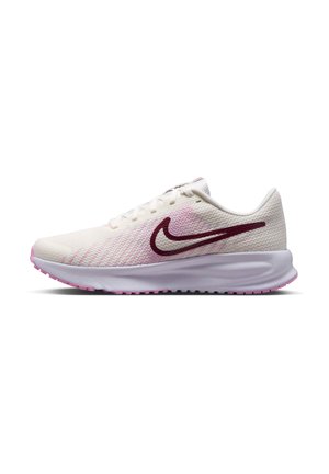 Scarpa da corsa Nike bianca e rosa con logo swoosh marrone, tomaia in mesh traspirante e suola ammortizzata per uso atletico.