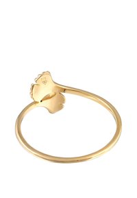 Anello in oro con un design floreale sulla parte superiore, fascia liscia e incisioni all'interno. Finitura lucida con un aspetto brillante.