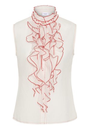 Ermeløs hvit bluse med brettet front og krage, med røde sømmer langs kantene og en liten perleknapp ved halsen.