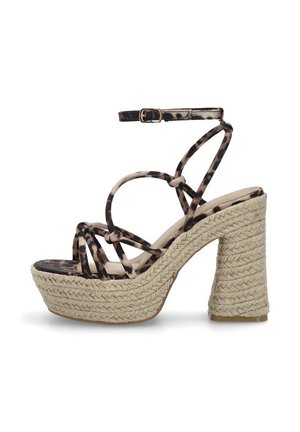 Sandalias de plataforma con estampado de leopardo, tacón de cuña de yute trenzado, correa en el tobillo ajustable y tiras cruzadas en los dedos.