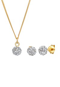 Guld kæde med en rund rhinestones vedhæng, ledsaget af matchende rund rhinestones ørestikker. Struktureret overflade, skimrende detaljer.