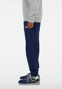 New Balance ATHLETICS JOGGER - Treningo apatinė dalis - nb navy