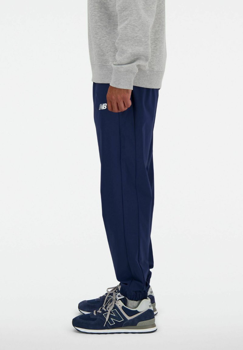 New Balance ATHLETICS JOGGER Tracksuit bottoms nb navy/blue
