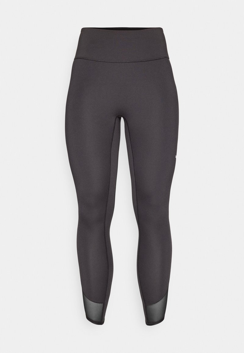Leggings negros de cintura alta, tejido elástico suave, corte ajustado, acentos de malla en el dobladillo, costuras reforzadas y sin marca visible.