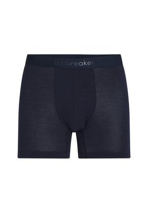 Herre boxershorts i marineblå med en bred linning, hvor mærkenavnet "icebreaker" er diskret trykt i kontrastfarve.