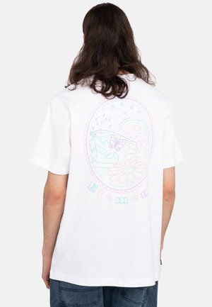 White cotton t-shirt featuring a pastel graphic design of flowers, a butterfly, and a sun, framed by a circular border and the word "Elements."