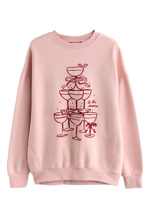 Rosa sweatshirt med ett rött motiv av staplade cocktailglas med rosetter och dekorationer, rund halsringning och ribbade muddar.
