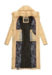 Beige puffer coat with a quilted design, featuring a black and gray leaf-patterned lining and red accents along the zipper and edges.