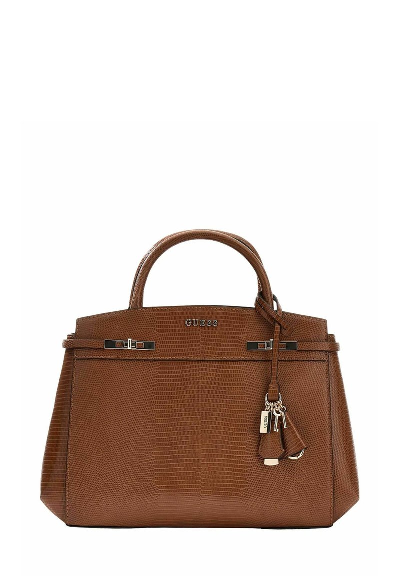 Sac à main marron texturé avec une forme structurée, deux poignées supérieures et un charm amovible. Comprend des ferrures argentées et des détails de marque.