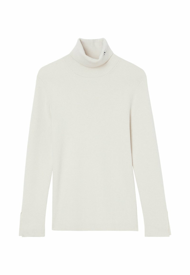 Ribbad vit polotröja med lång ärm och sidslitsar i fållen. Har en diskret logotyp vid kragen. Mjuk textur.