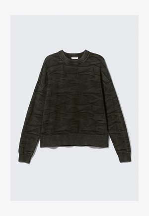 Dark green knit sweater with a textured pattern, round neck, long sleeves, and ribbed cuffs and hem. Material appears soft and flexible.