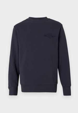 Temno modra majica s kapuco iz mešanice bombaža, z okroglim izrezom, dolgimi rokavi in subtilnim vtisnjenim logotipom spredaj. Gladek tekstura.