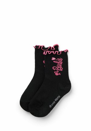 Černé ponožky s volánkovým růžovým vrškem; mají růžový nápis "Barbie" a akcenty srdíček, vyrobené z měkké a elastické látky.