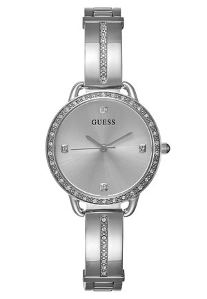 Montre en acier inoxydable argentée avec un cadran rond, des accents en diamants, un cadran texturé argenté et un bracelet poli comprenant des détails supplémentaires en cristal.