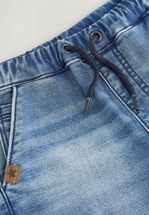 Blue denim shorts with a drawstring waist, featuring a gold star accent and a lightly faded texture.