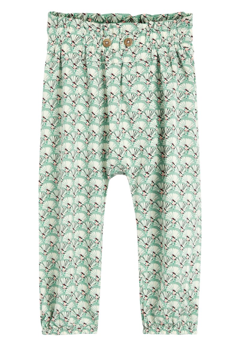 Pantalon enfant vert menthe avec taille élastique, deux boutons en bois et un motif floral blanc et rouge en forme d’éventail répété.
