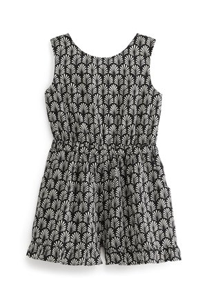 Black sleeveless romper featuring a white leaf pattern, elastic waist, pockets, and ruffled trim at the hem. Made from lightweight fabric.