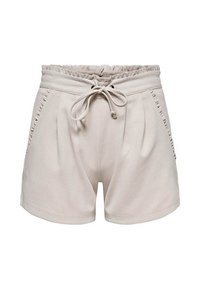 Pantaloni beige con vita regolabile, tasche laterali e dettagli testurizzati lungo le cuciture. Tessuto morbido, vestibilità rilassata e lunghezza fino a metà coscia.