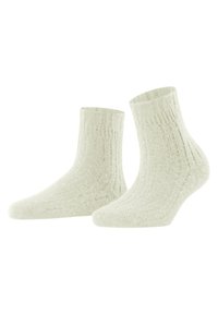 Calzini alla caviglia a coste in off-white, realizzati in un materiale morbido. Presentano una superficie testurizzata e un design aderente per il massimo comfort.
