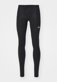 Black full-length athletic leggings with drawstring waist and small New Balance logo on upper thigh.
