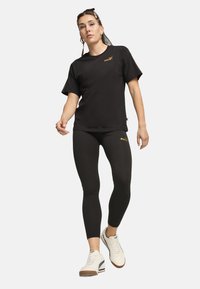 Puma Camiseta estampada - black