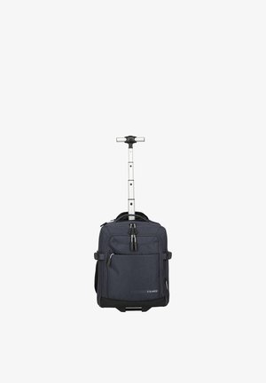 Dark blue soft-sided rolling suitcase with extended silver telescopic handle and multiple zippered compartments.