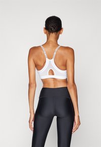 Under Armour LOW BRA - Light support sports bra - white/black